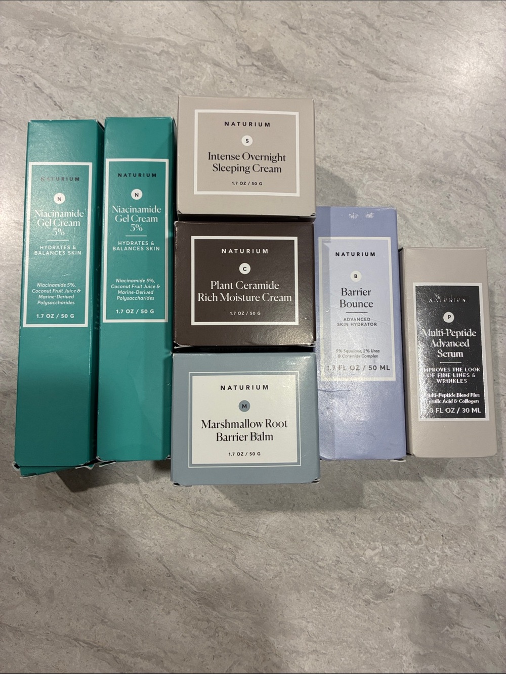 Naturium Skincare Set - Multiple Creams & Serums in Teal, Gray, Lavender, Black